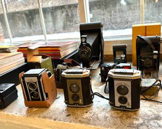 Antique cameras, how to DYI literature.