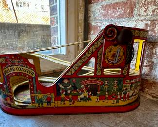 1959's J. Chein, tin litho wind up roller coaster.
