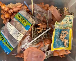 Many doll parts