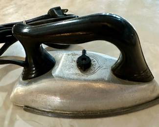 1950’s Dolly Dell toy electric iron.