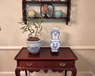 Ball and claw chippendale mahogany server with pull out trays at both sides.  Mahogany wall shelf with contents available for sale.