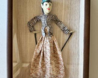 Indonesian puppet in shadow box.
