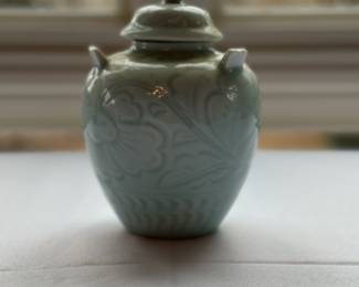 One of two available lidded celadon jars.