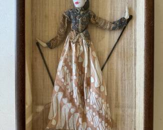 Indonesian puppet in shadow box.
