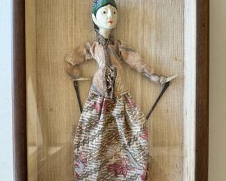 Indonesian puppet in shadow box.