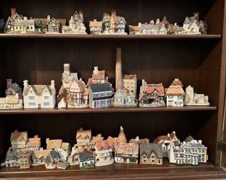 Contents of antique secretary are for sale.