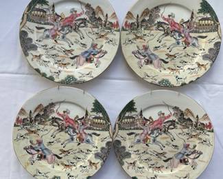 Two mirrored pairs of fox hunt scene on porcelain.