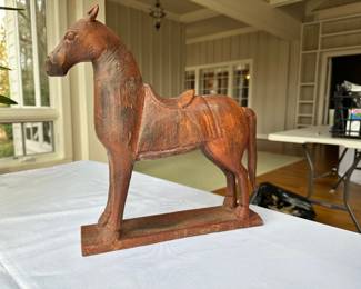 Handcarved and painted wooden horse.