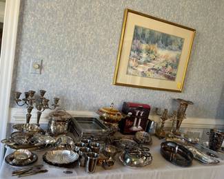 Table display of sterling and silver plate