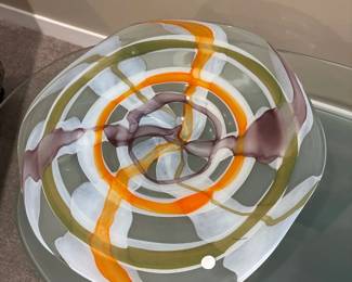 Murano art glass bowl, characterized by its swirling patterns of color