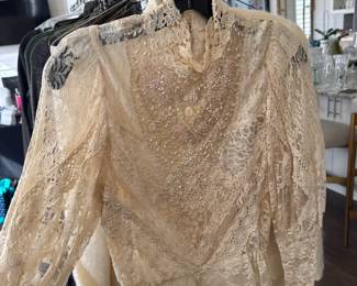 hand made lace and beaded top with peplum trim and mock neck