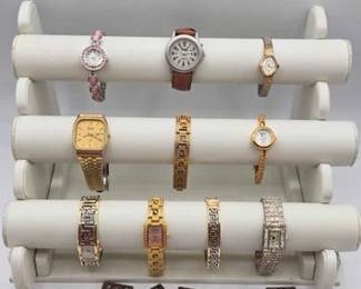 1154  9 Wrist Watches  2 Bracelets 