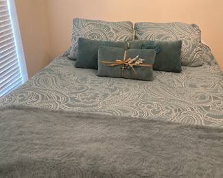 Queen size Mattress, Turquoise Comforter with pillows and Picture