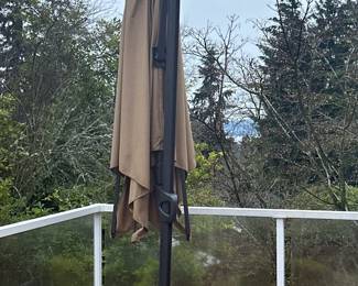 Patio umbrella with stand