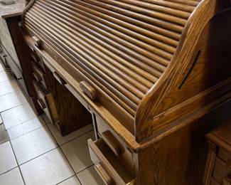 A NICE OAK ROLL TOP DESK...