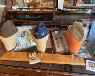 Militaria! We have medals from WW-2, Air Force caps, books and other collectibles...