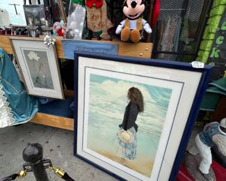 Foreground and nicely matted, numbered, signed and framed in blue lacquer is a Susan Rios art piece.