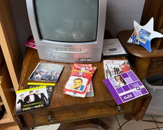 SORRY DVD T.V. NOT FOR SALE BUT TABLE AND DVDS ARE!