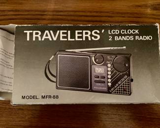 Travelers' LCD Clock and 2 Bands Radio