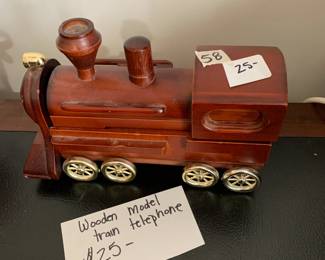 #58	Wood Model Train Telephone	 $25.00 			
