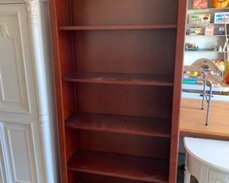 #154	Wood bookcase with 5 shelves 32x12x76	 $100.00 			
