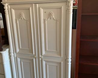 #155	Stanley white painted armoire with 2 drawers and hanging bar 39x22x72	 $125.00 			
