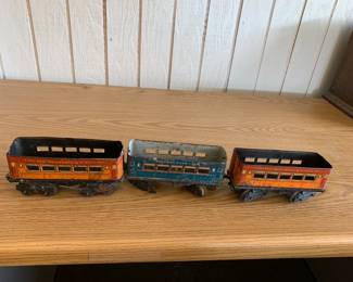 #195	3 piece metal train cars	 $30.00 			
