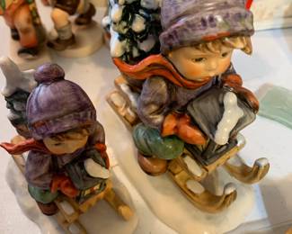 #99	Set of 2 Hummels of young boys on Sleds - 6" T and 4" tall	 $20.00 			
