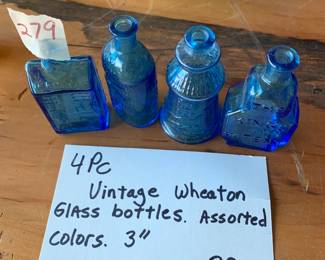 #279	vintage 3" Wheaton blue color bottle  (4)	 $30.00 			
