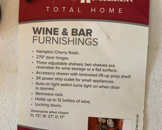 #10	Howard Miller wine and Bar Ham-ton Cherry Finish Wood  Cabinet 27x17x72 w/2 doors, Glass Rack w/12 Holder for 12 wine bottles w/1 drawer w/key	 $225.00 			

