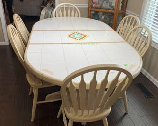 #7	Dinoire (Buffalo NY) Wood Cream Painted Table w/1 leaf & 6 chairs has ceramic tile top  - 60-75x44x29 	 $175.00 			
