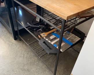 #158	wood top table with a metal base 2   shelf 40x24x36	 $75.00 			
