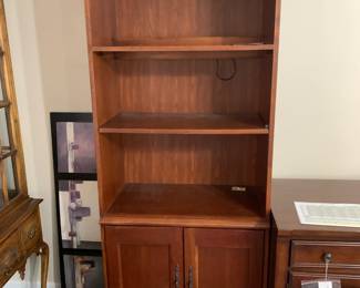 #18	Laminate Bookcase w/2 doors & 2 shelves - lighted - 30x16x77	 $75.00 			
