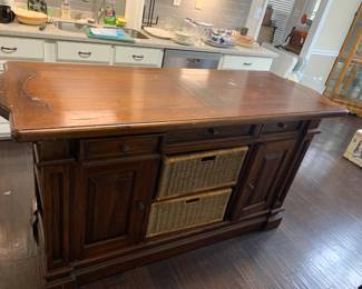 #8	Hand-crafted Pine Wood Island w/2 doors w/shelf (on either side), 3 drawers ,  and 2 baskets   72x27x38	 $425.00 			
