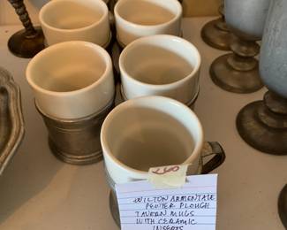 #268	Wilton Armentalevern  pewter plough Tavern mugs with ceramic inserts set of 7	 $30.00 			
