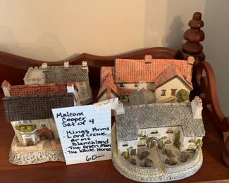 #308	Malcom cooper set of (4) stone houses	 $60.00 			
