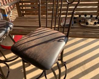 #132	metal base leather look swivel bar chair 24 tall	 $20.00 			
