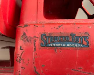 #169	Red dump truck Structo Toys 19" long	 $55.00 			
