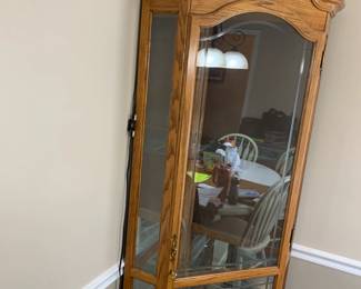 #29	Corner display cabinet with 4 glass shelves 2 glass doors 34x8x82	 $175.00 			
