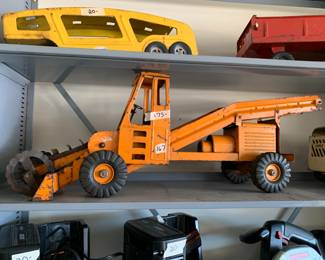 #167	Vintage orange metal truck 32" long	 $75.00 			
