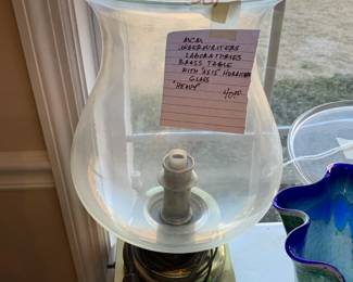 #310	MCA underwriters Laboratories Brass table lamp w as is Hurricane glass HEAVY	 $40.00 			
