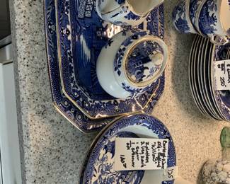 #125	Early Ware England "Old Pattern" Willow - w/gold trim  - 2 platters, 2 veggie and sugar and creamers	 $100.00 			
