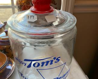 #119	Tom's Glass Jar Countertop Peanut w/lid w/embossed Red Knob - 11"T x 8"W	 $55.00 			
