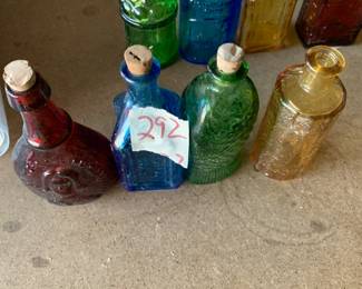 #292	vintage 3" Wheaton color bottles (4)	 $30.00 			
