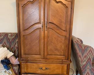 #38	Stanley Armoire (TV Cabinet) w/4 drawers & 2 doors - 37x17x77	 $75.00 			
