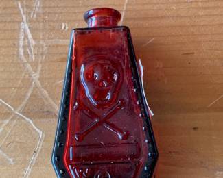#172	Red glass poison medicine bottle 3"tall	 $25.00 			
