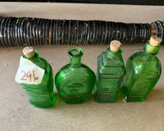 #296	vintage 3" Wheaton green bottles (4)	 $30.00 			
