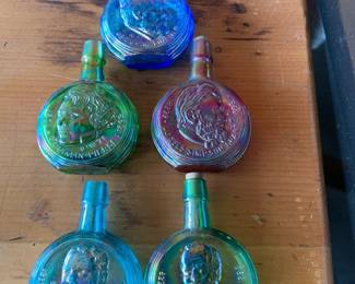 #288	vintage 3 " face bottles (5)	 $40.00 			
