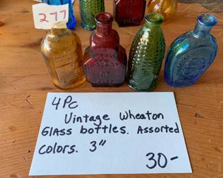#277	Vintage Wheaton color bottles (4)	 $30.00 			
