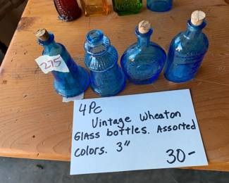 #275	Vintage Wheaton blue color 3" bottles (4) color bottles (4)	 $30.00 			
